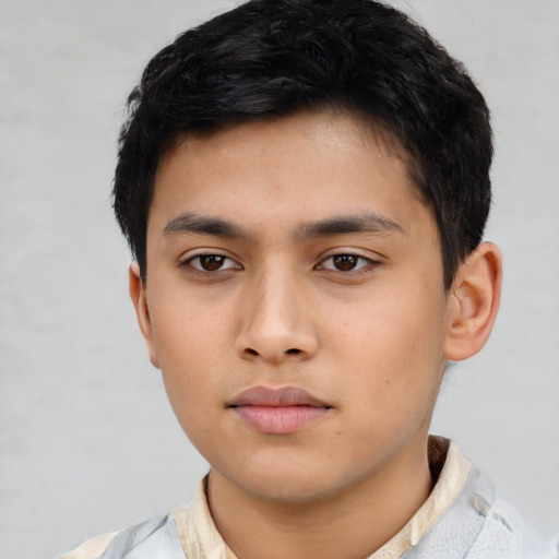 Neutral asian child male with short  black hair and brown eyes