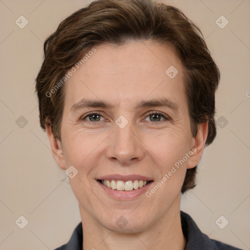 Joyful white adult female with short  brown hair and brown eyes