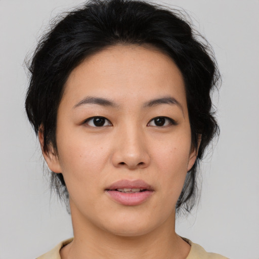 Neutral asian young-adult female with medium  black hair and brown eyes