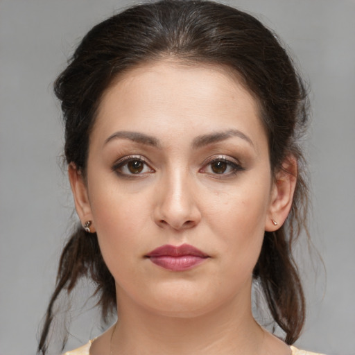Neutral white young-adult female with medium  brown hair and brown eyes