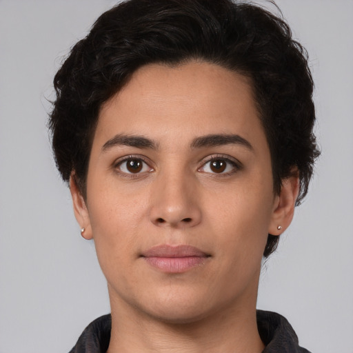 Neutral white young-adult female with short  brown hair and brown eyes