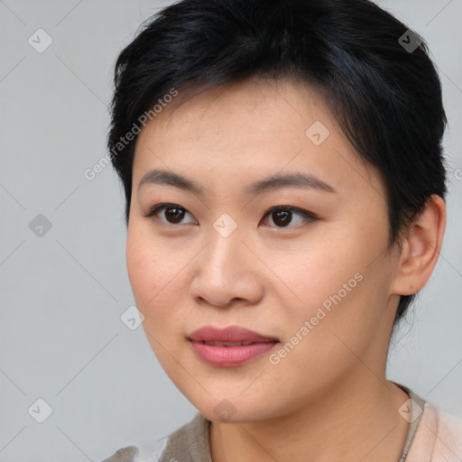 Joyful asian young-adult female with medium  brown hair and brown eyes