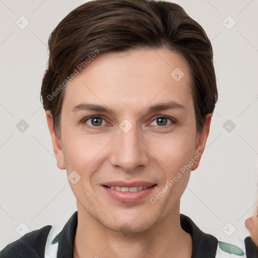 Joyful white young-adult female with short  brown hair and grey eyes