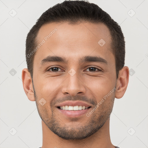 Joyful white young-adult male with short  brown hair and brown eyes