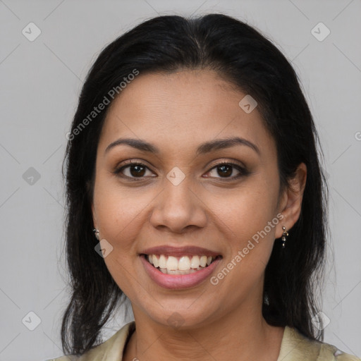 Joyful latino young-adult female with medium  brown hair and brown eyes