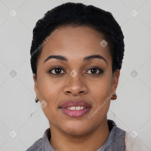 Joyful black young-adult female with short  black hair and brown eyes