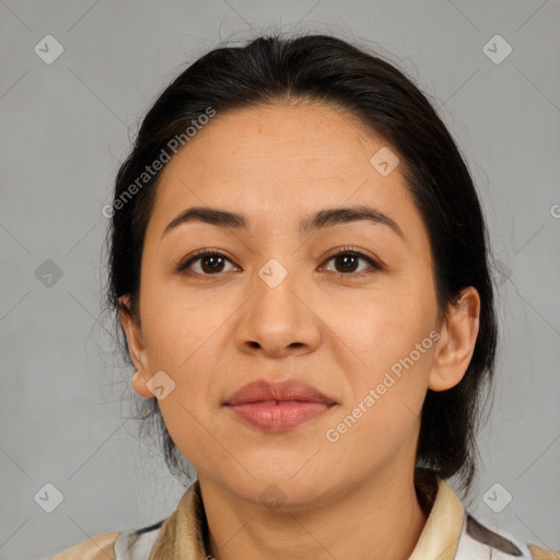 Joyful asian adult female with medium  brown hair and brown eyes