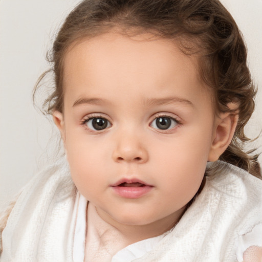 Neutral white child female with medium  brown hair and brown eyes