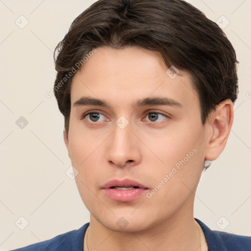 Neutral white young-adult male with short  brown hair and brown eyes