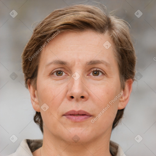 Joyful white adult female with short  brown hair and brown eyes