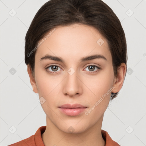 Neutral white young-adult female with short  brown hair and brown eyes