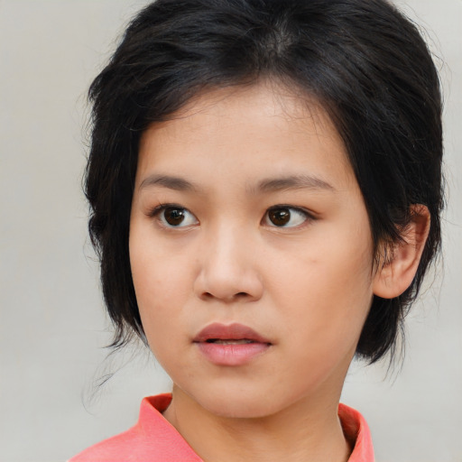 Neutral asian child female with medium  brown hair and brown eyes