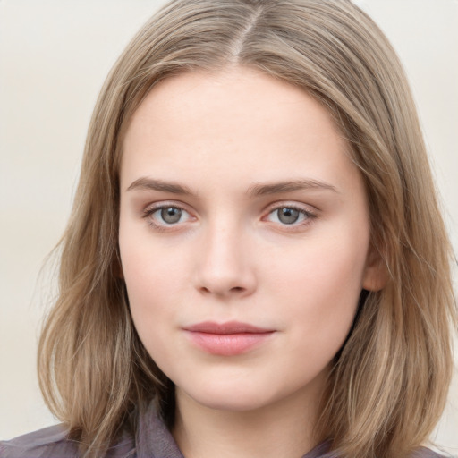 Neutral white young-adult female with medium  brown hair and grey eyes