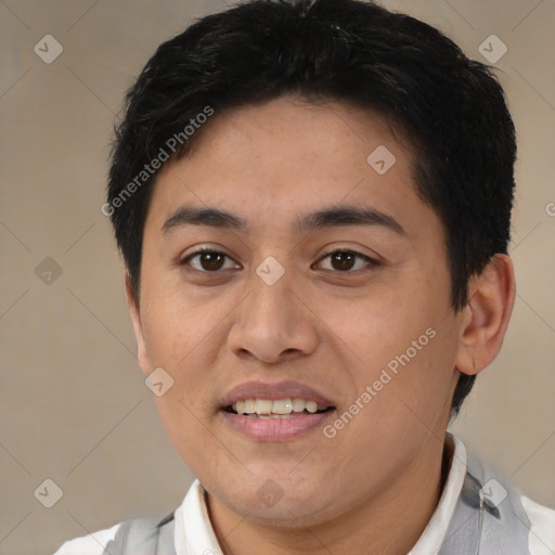 Joyful latino young-adult male with short  black hair and brown eyes