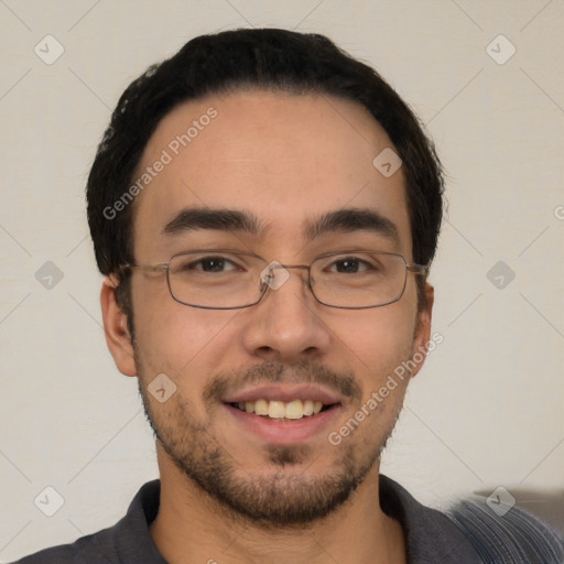 Joyful white young-adult male with short  black hair and brown eyes