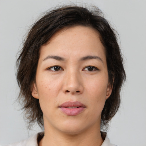 Neutral asian young-adult female with medium  brown hair and brown eyes