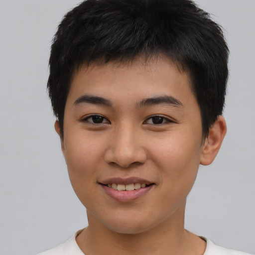 Joyful asian young-adult male with short  brown hair and brown eyes