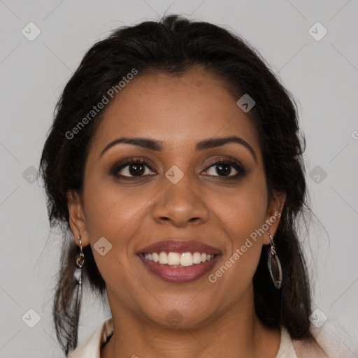 Joyful black young-adult female with medium  brown hair and brown eyes