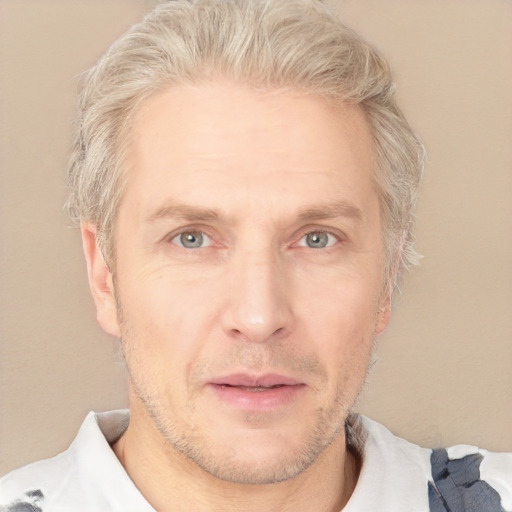 Neutral white adult male with short  blond hair and grey eyes