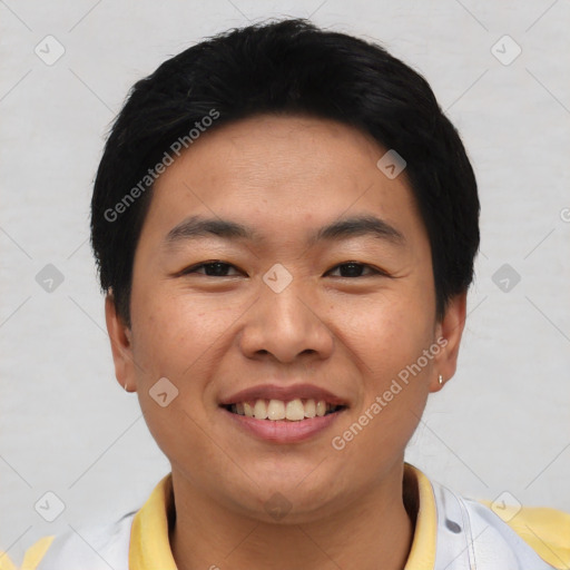 Joyful asian young-adult male with short  black hair and brown eyes
