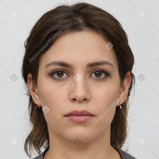 Neutral white young-adult female with medium  brown hair and brown eyes