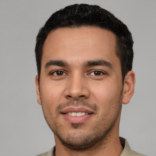 Neutral white young-adult male with short  black hair and brown eyes