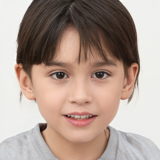 Joyful white child female with short  brown hair and brown eyes