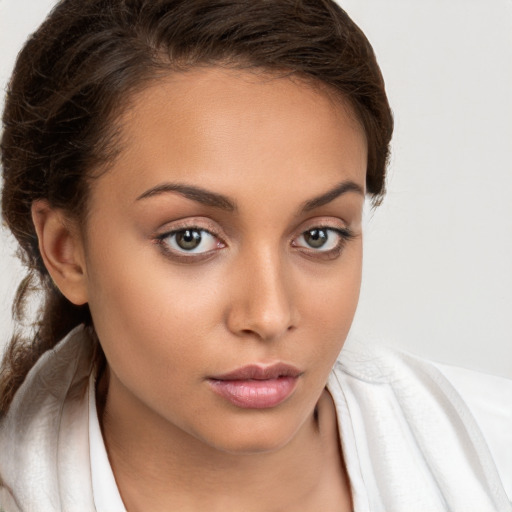 Neutral white young-adult female with medium  brown hair and brown eyes