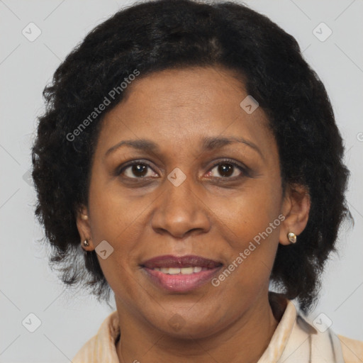 Joyful latino adult female with medium  brown hair and brown eyes
