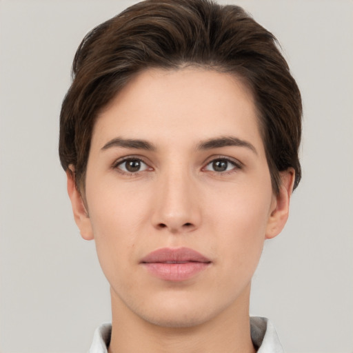 Neutral white young-adult female with short  brown hair and brown eyes