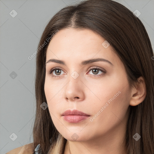 Neutral white young-adult female with long  brown hair and brown eyes