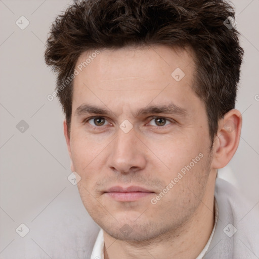 Neutral white adult male with short  brown hair and brown eyes