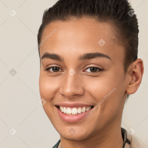 Joyful white young-adult female with short  brown hair and brown eyes