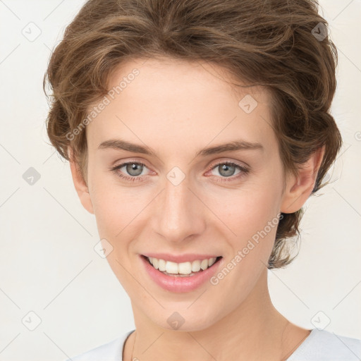 Joyful white young-adult female with medium  brown hair and green eyes