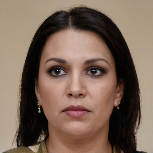 Neutral white young-adult female with medium  brown hair and brown eyes