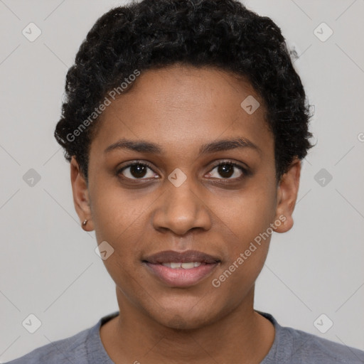 Joyful black young-adult female with short  black hair and brown eyes