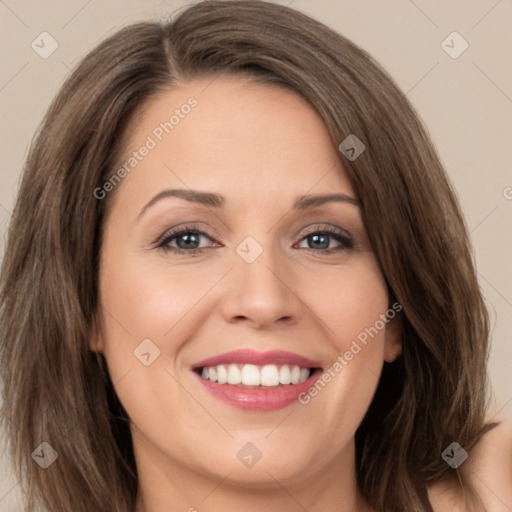 Joyful white young-adult female with medium  brown hair and green eyes