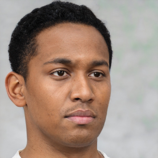 Neutral black young-adult male with short  brown hair and brown eyes