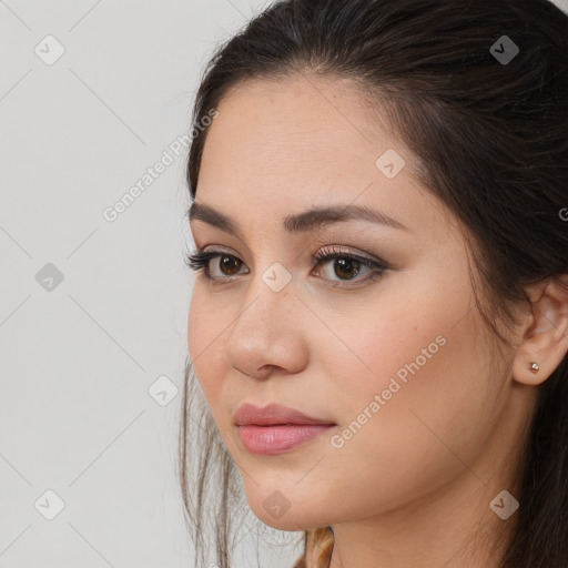 Neutral white young-adult female with long  brown hair and brown eyes