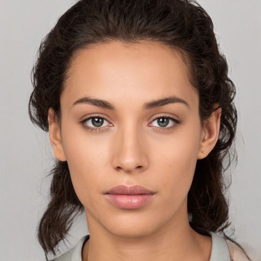 Neutral white young-adult female with medium  brown hair and brown eyes