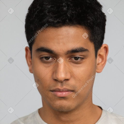 Neutral latino young-adult male with short  black hair and brown eyes