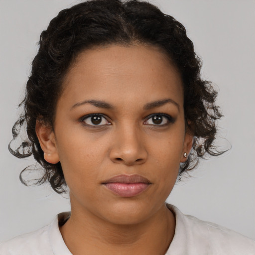 Neutral latino young-adult female with short  brown hair and brown eyes