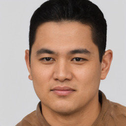 Neutral latino young-adult male with short  brown hair and brown eyes