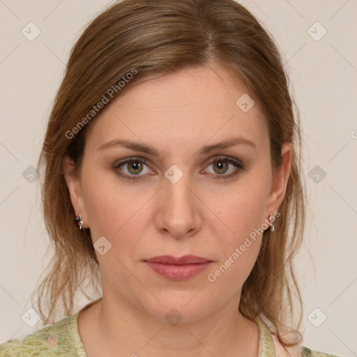 Joyful white young-adult female with medium  brown hair and green eyes