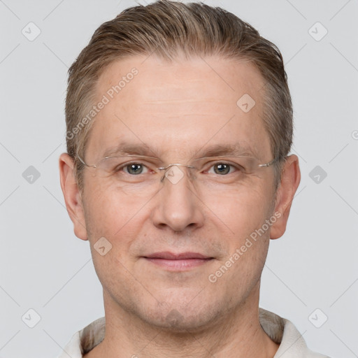 Joyful white adult male with short  brown hair and grey eyes