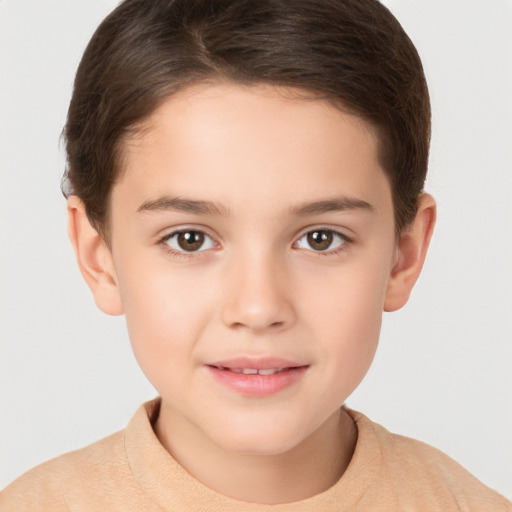 Joyful white child female with short  brown hair and brown eyes