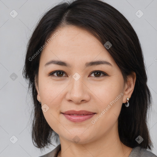 Joyful white young-adult female with medium  brown hair and brown eyes