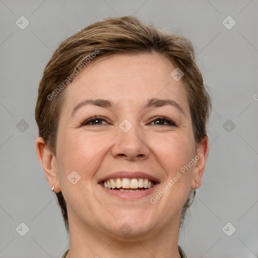 Joyful white adult female with short  brown hair and grey eyes