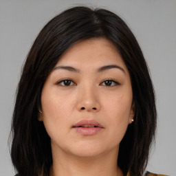 Neutral asian young-adult female with medium  brown hair and brown eyes