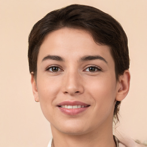 Joyful white young-adult female with short  brown hair and brown eyes